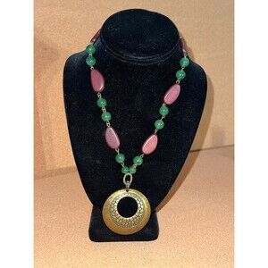 Avon SAQ brass medallion pendant necklace with green and brown beads 18 in VTG